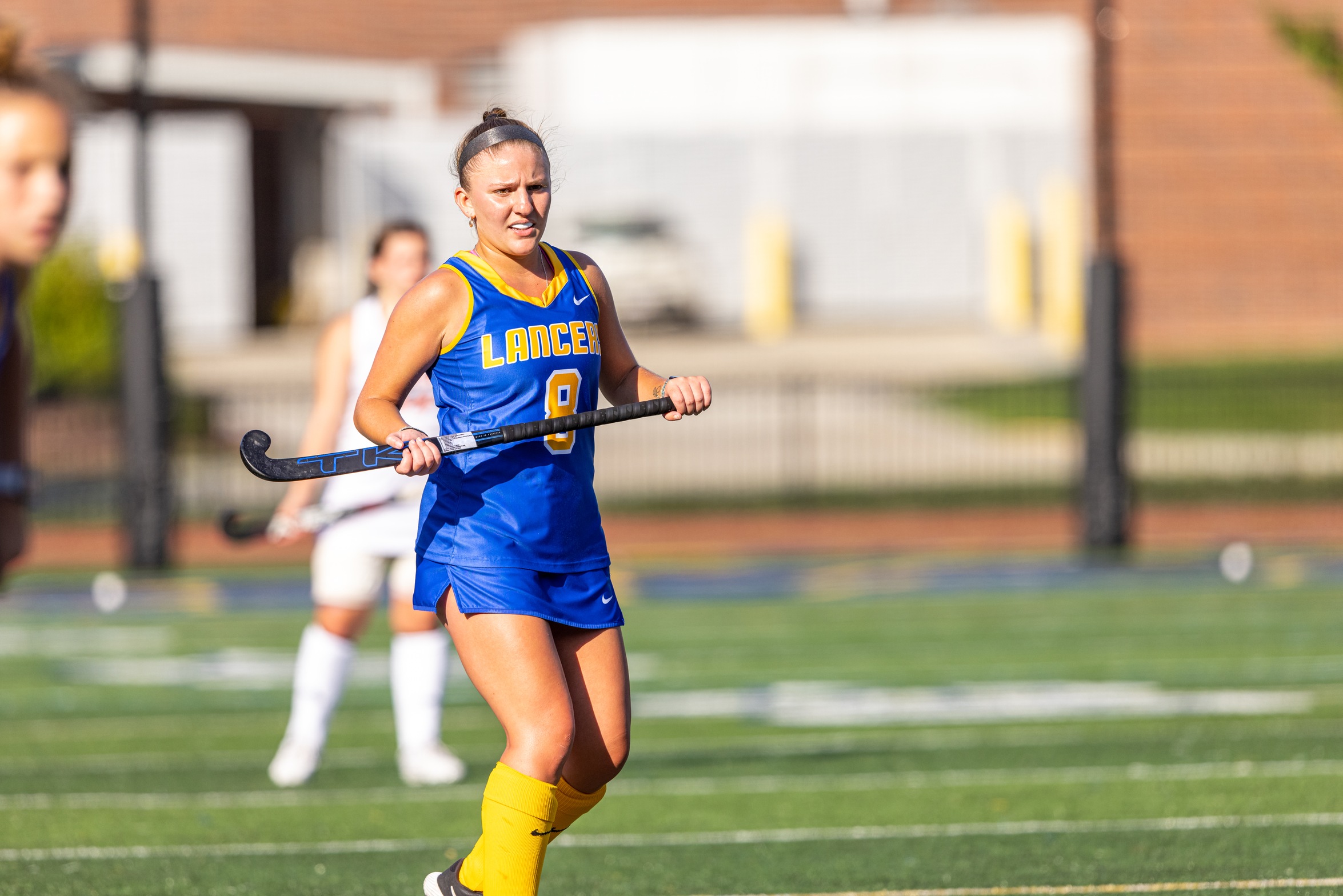 LANCERS TOP LYONS IN OVERTIME